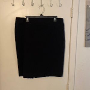 Liz Claiborne black pencil skirt with a double kick pleat in back. Size 14